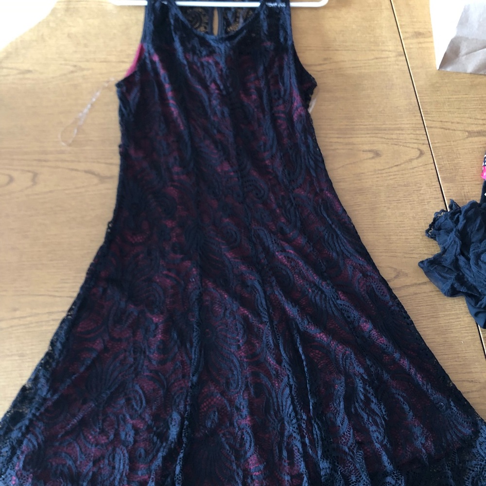 Black lace with red underlay